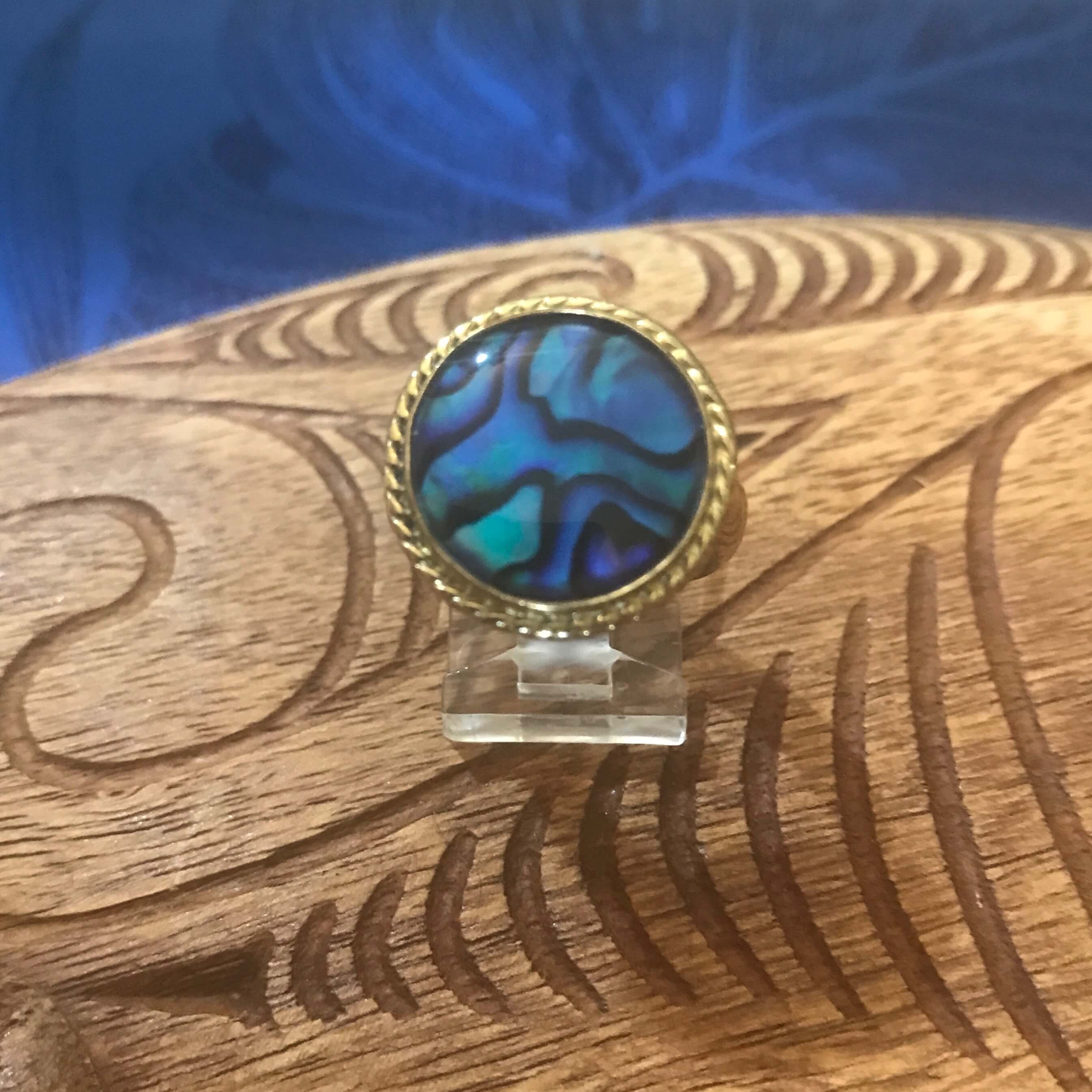 Front top view of blue abalone shell ring with alchemia gold rope trim setting | Aloha Products USA