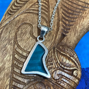 Back view of a blue beach glass pendant necklace with an abstract shape in a stirling silver setting