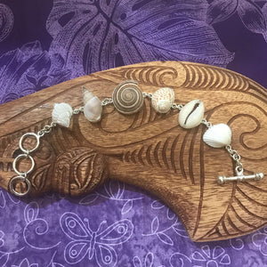 Island jewelry multi- shell link bracelet with cowry, nassa, and sundial shells set on sterling silver | Aloha Products USA