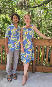 Attractive Hawaiian couple wearing matching blue  floral dress and shirt for family outfit | Aloha Products USA