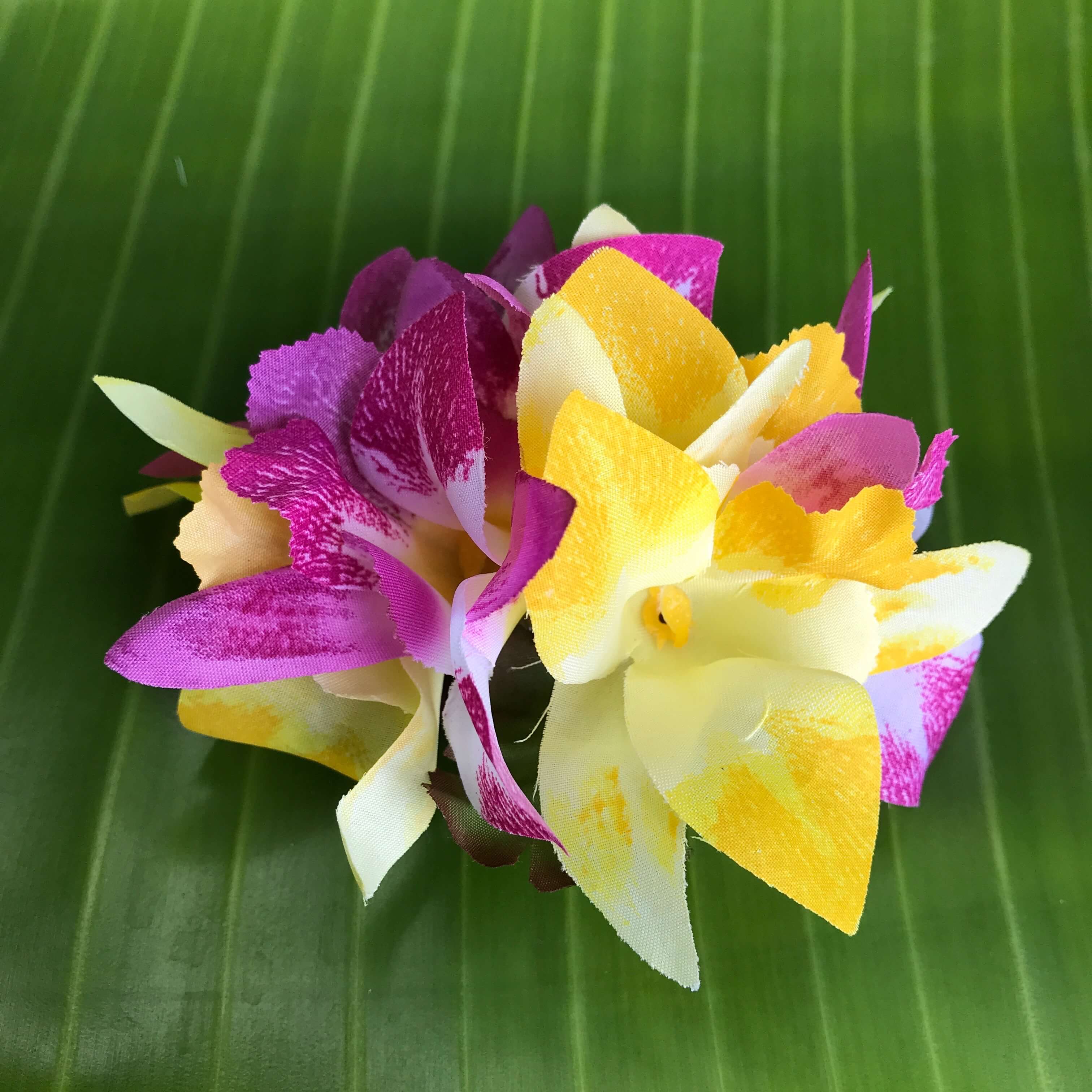 Hawaiian silk flower hair clip with purple, pink and white orchids | Aloha Products USA