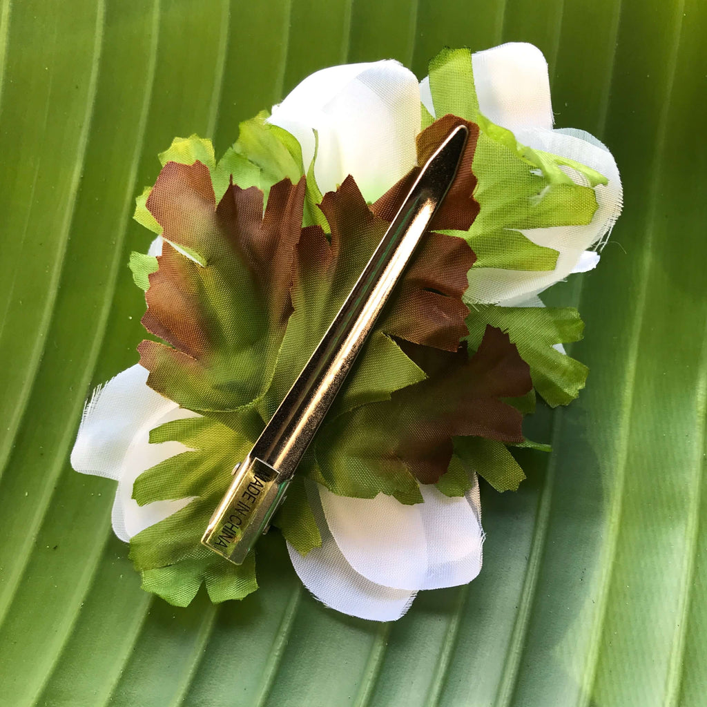 Back view of a white gardenia silk flower hair clip