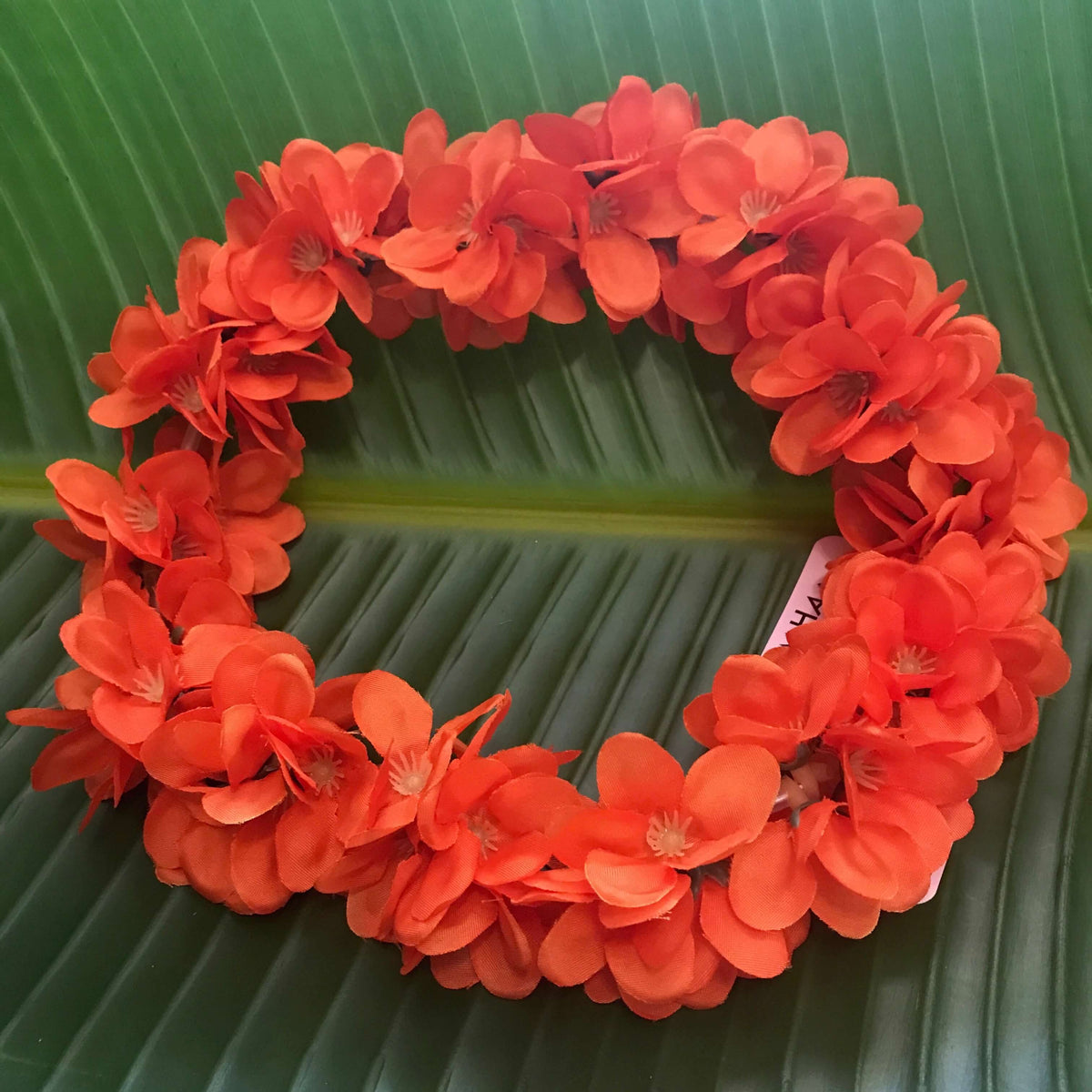 Orange Hawaiian silk head lei with mini plumeria flowers used for headband | Aloha Products USA