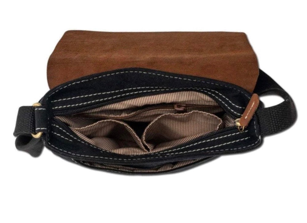 Inside view of a black canvas messenger bag with interior compartments