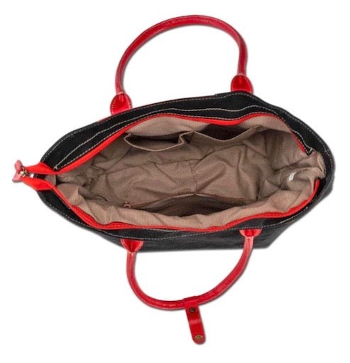 Inside view of red leather tote bag with interior compartments