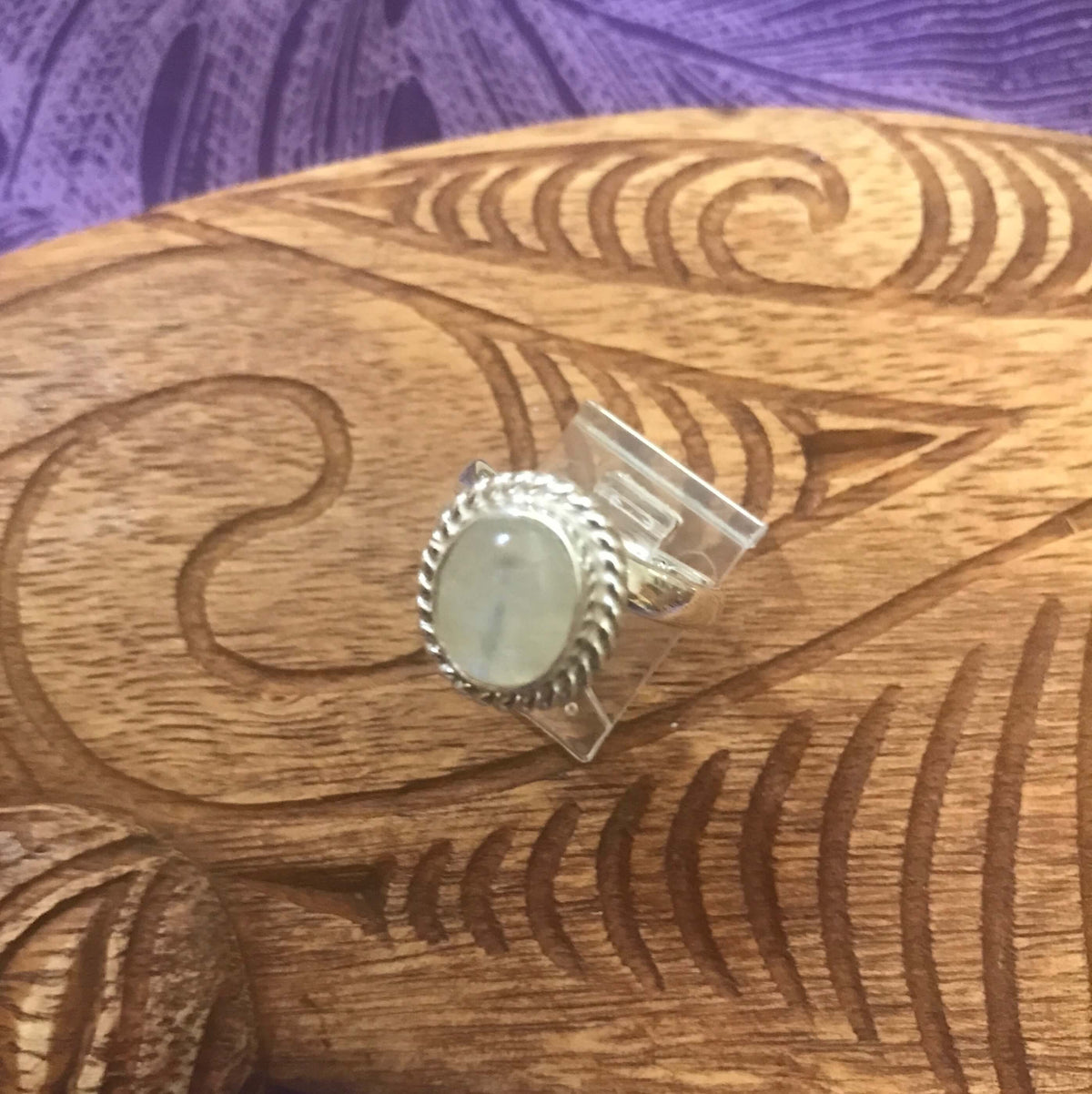 Top front view of round moonstone ring set on stirling silver | Aloha Products USA