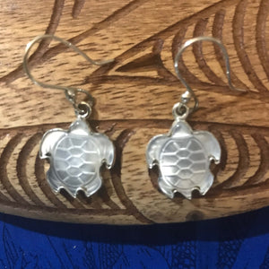 Close up view of MOP turtle drop earrings with stirling silver setting | Aloha Products USA