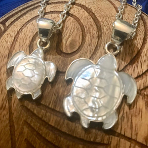 Small and large MOP turtle pendant necklaces with stirling silver settings | Aloha Products USA