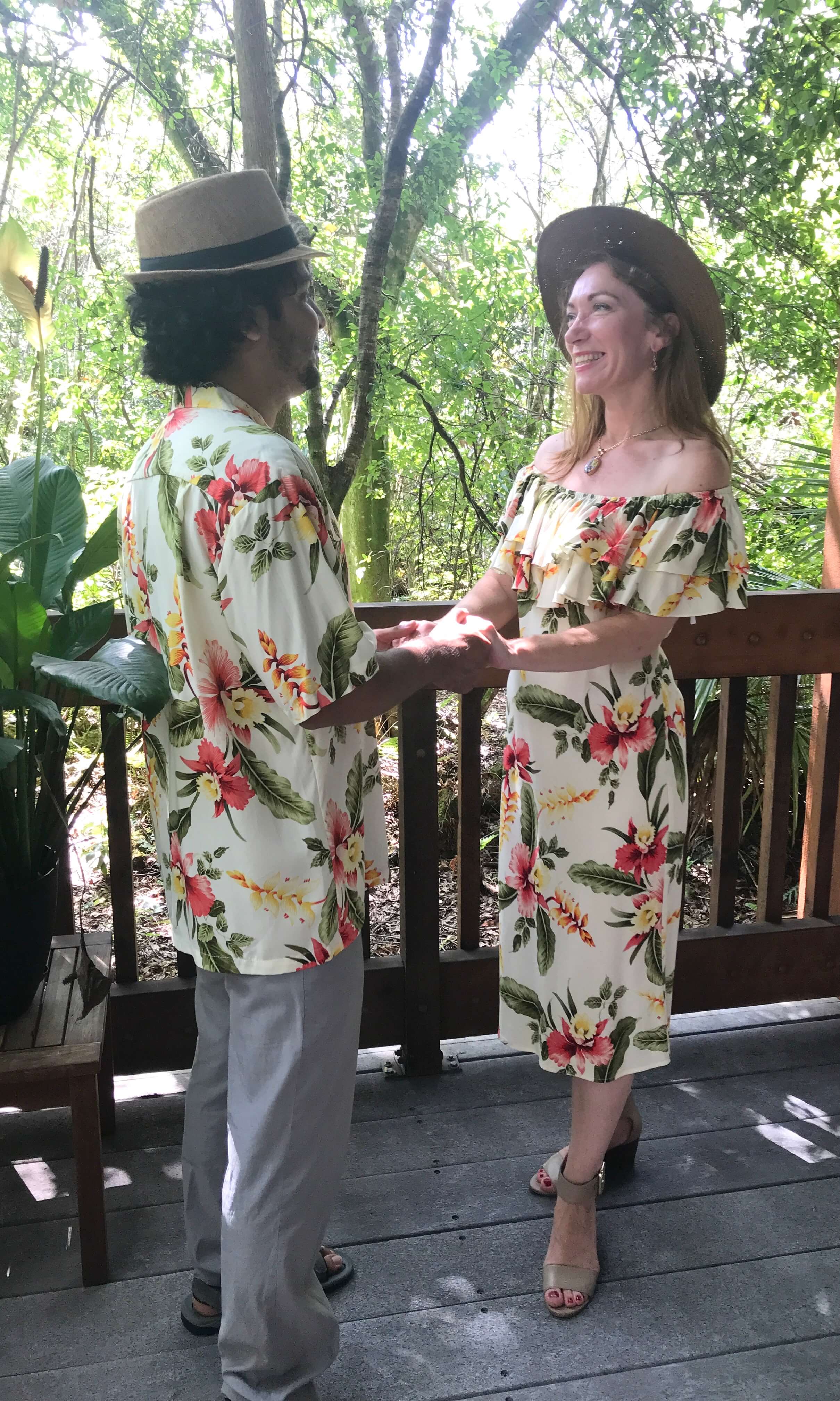 Couple wearing matching Hawaiian hibiscus shirt and dress for family outfit | Aloha Products USA
