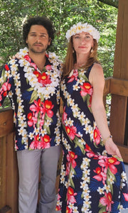 Matching Hawaiian couple wearing shirt and dress in hibiscus lei for family outfit | Aloha Products USA