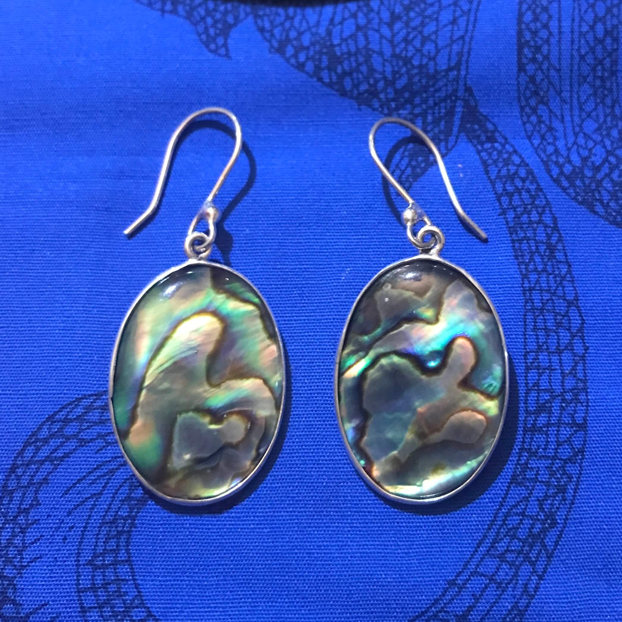 Close up view of natural abalone drop earrings in sterling silver | Aloha Products USA