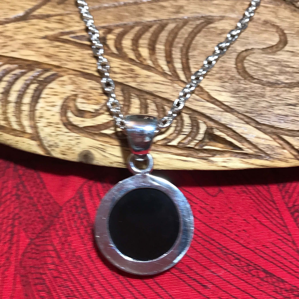 Back view showing the stirling silver setting for a cameo pendant