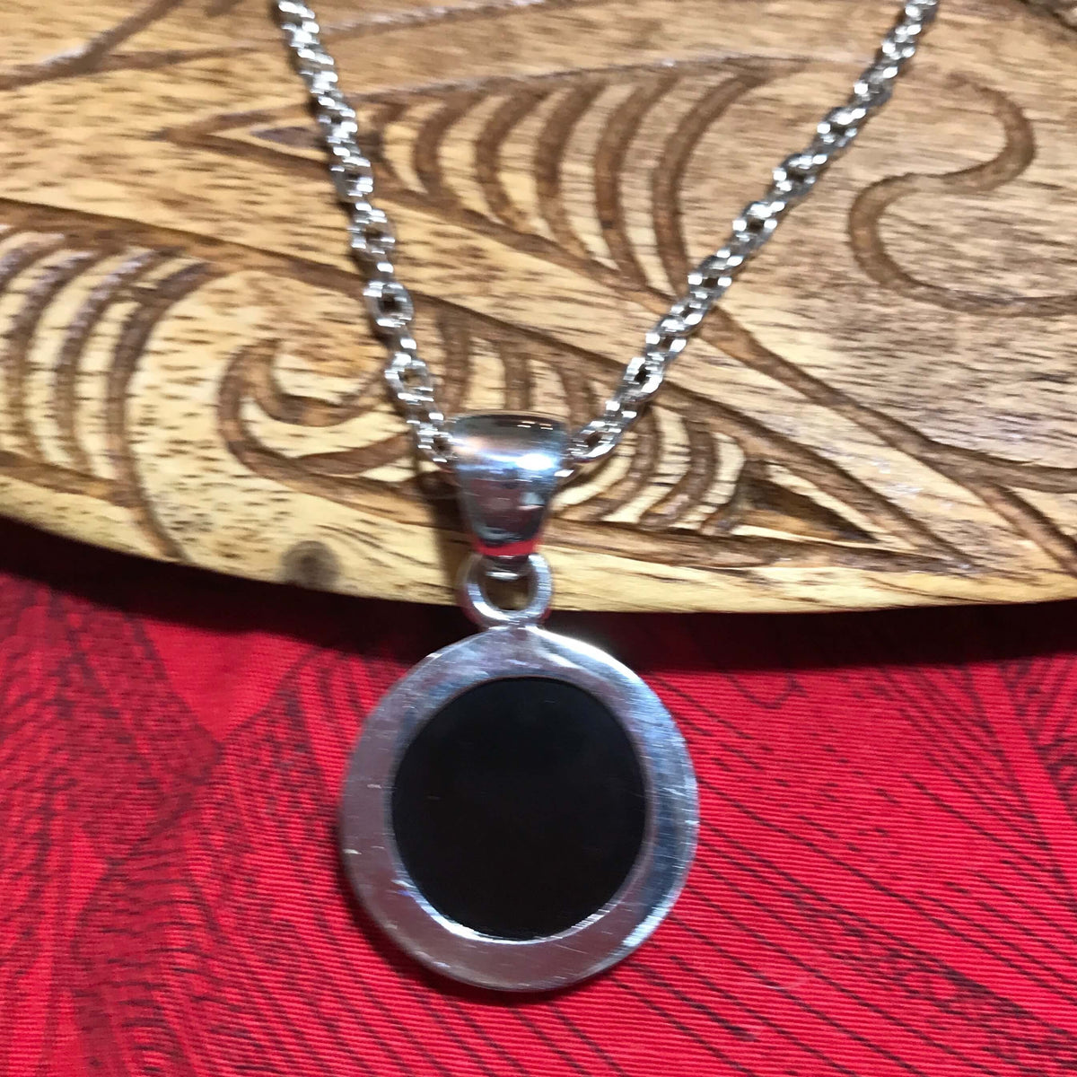 Back view showing the stirling silver setting for a cameo pendant