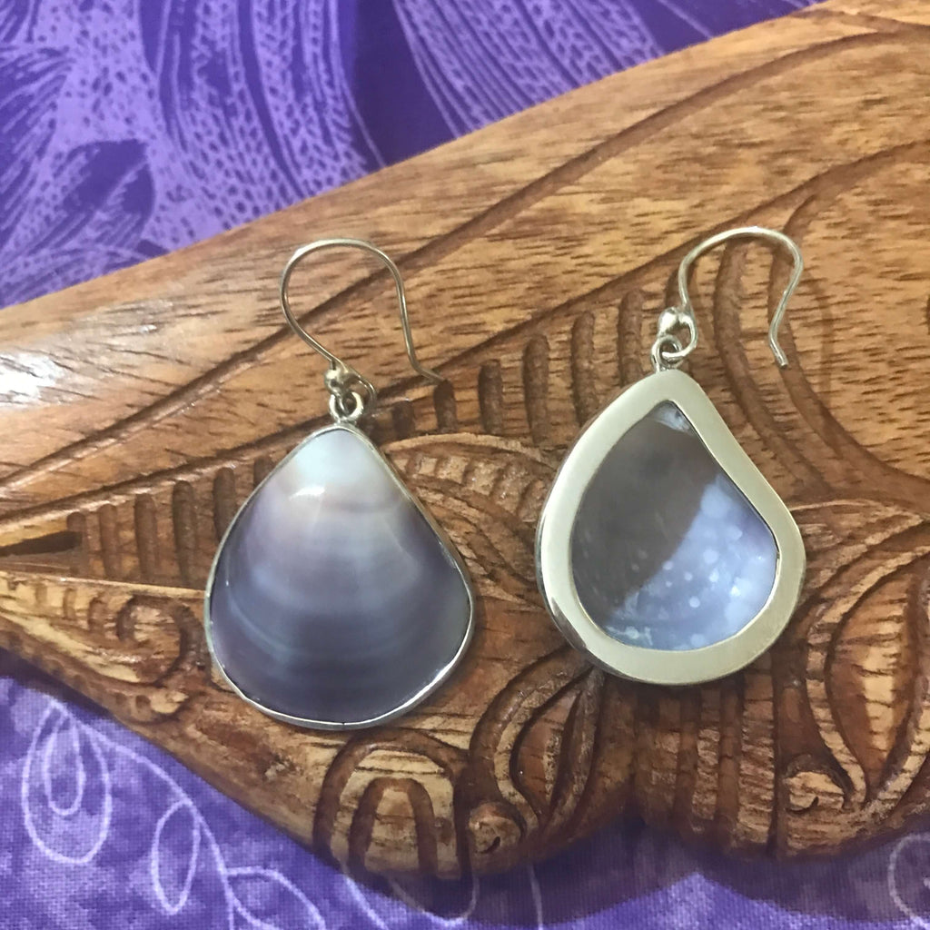 Back view of purple clam shell drop earrings set on stirling silver