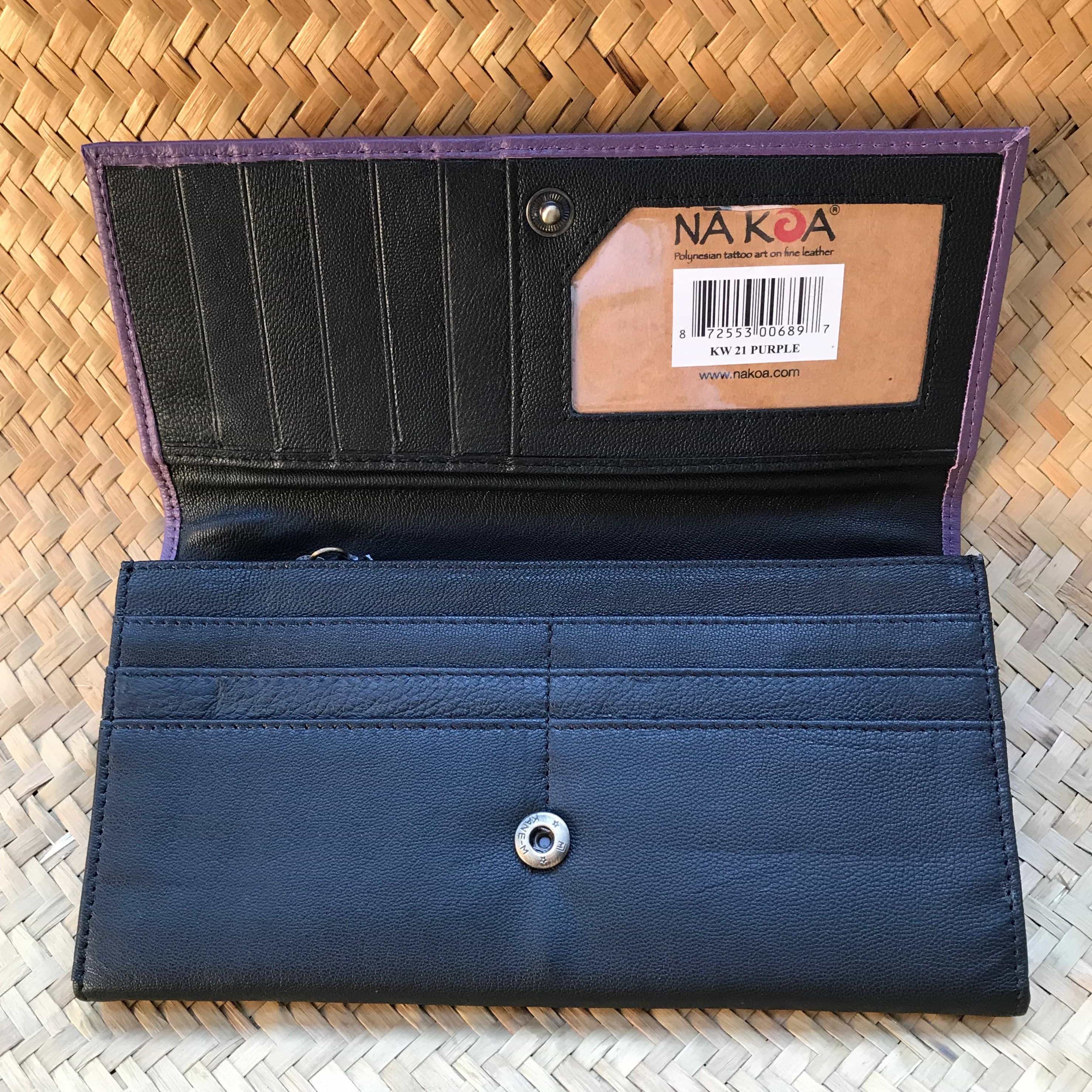 Open view of a purple clutch wallet
