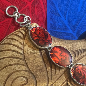 Close up view of red abalone shells for stirling silver link bracelet | Aloha Products USA