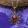 Island jewelry sun shaped pendant necklace with red abalone  and alchemia gold setting | Aloha Products USA