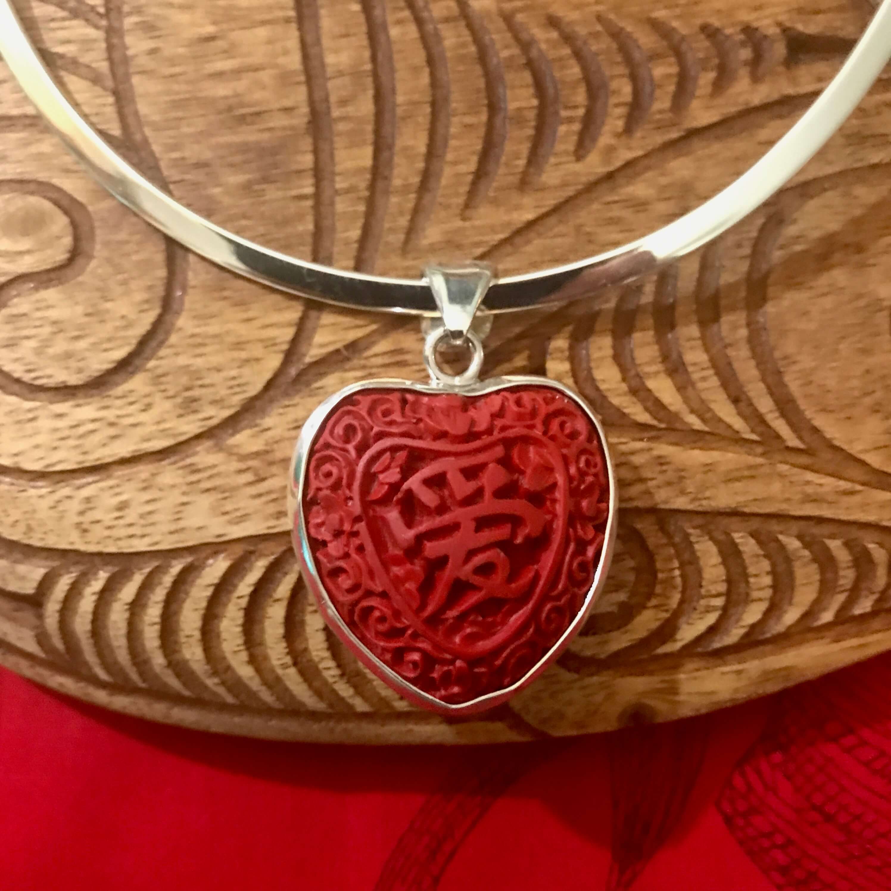 Island jewelry red cinnibar heart shaped pendant necklace with a stirling silver setting | Aloha Products USA