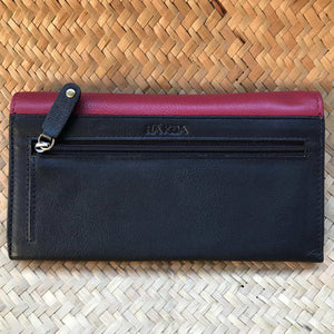 Back view of a red leather clutch wallet