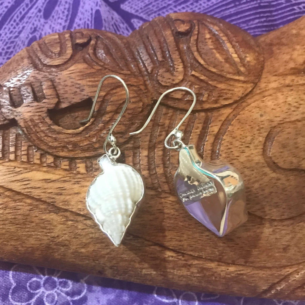 Back view of nassa shell drop earrings set in stirling silver